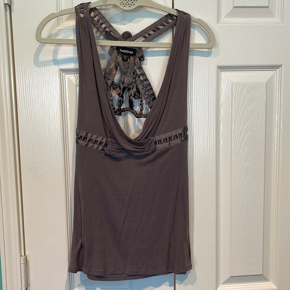 Super cute unique BeBe top. X-Small.